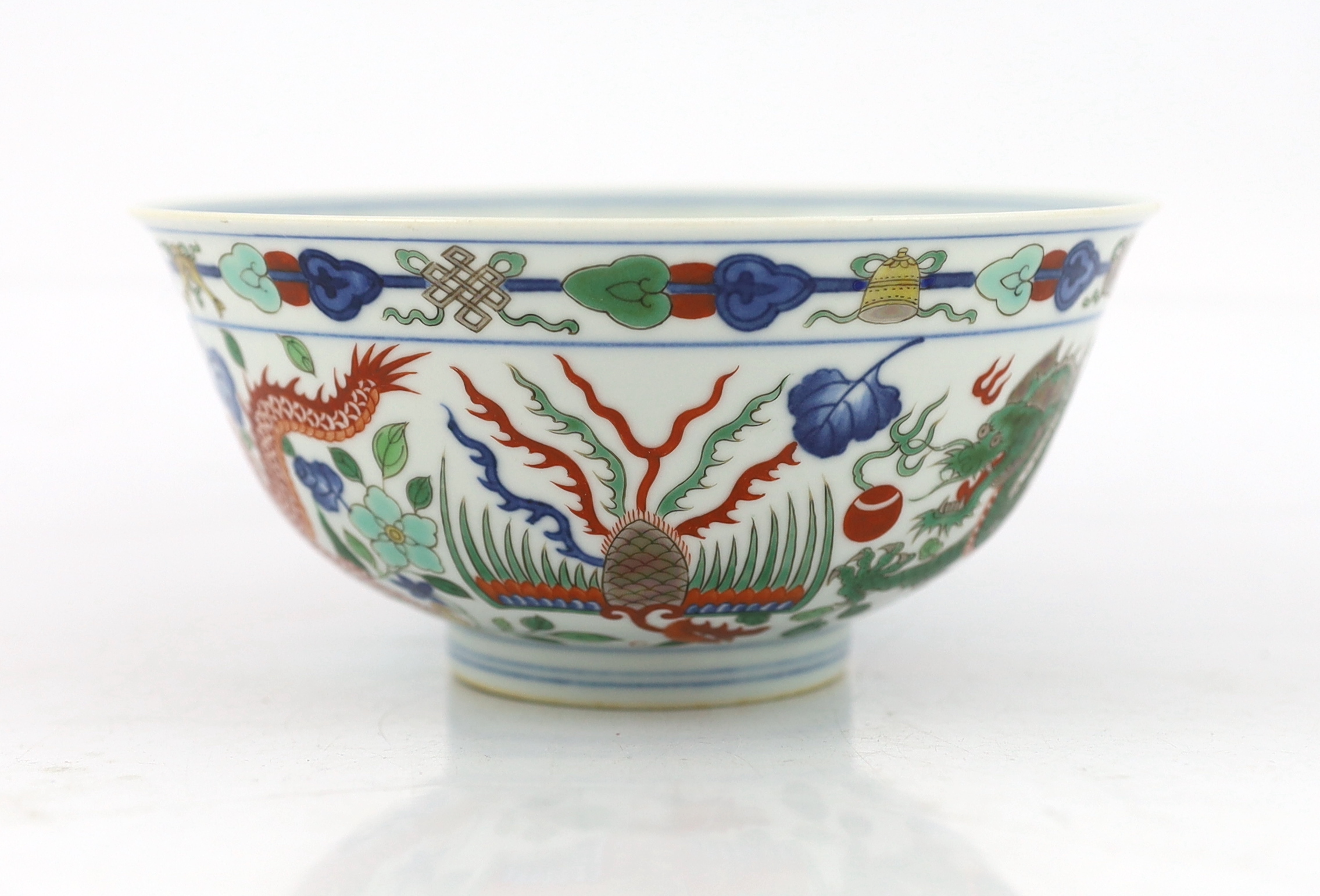 A Chinese wucai ‘dragon and phoenix’ bowl, Qianlong mark and possibly of the period